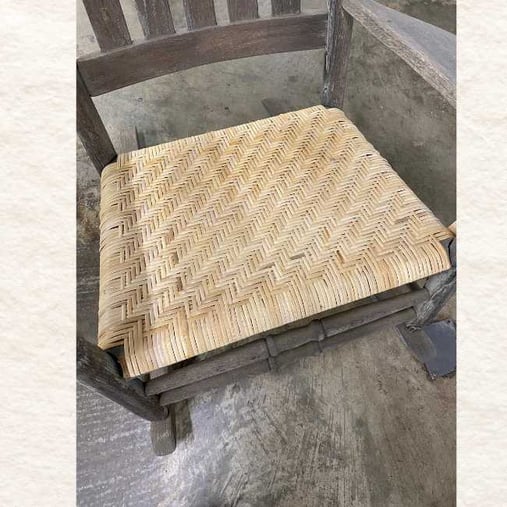 A flat reed woven seat