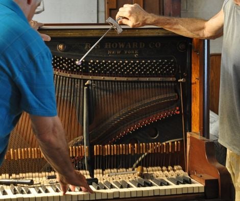 Chris and Assistant piano restoration; howard piano; raleigh, nc