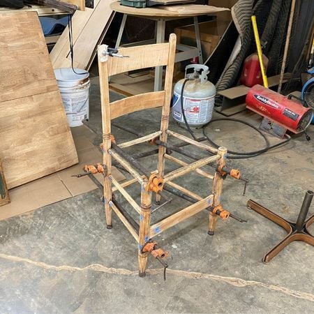 Clamping and gluing rushed chair; antique repair; antique refinishing; rush chair; antique furniture repair; raleigh, nc