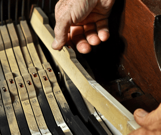 Close up of piano repair