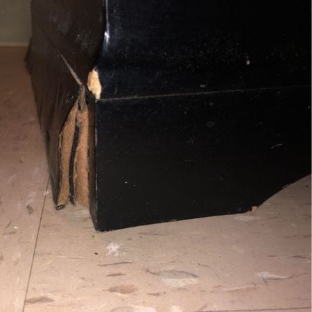 Corner of mdf dresser; water damage; raleigh, nc