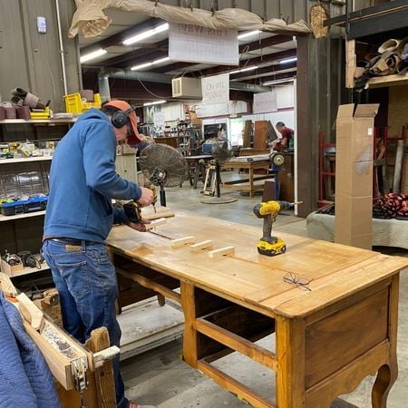 Cristian repairing badly split desk 2; antique furniture repair; wood furniture; raleigh, nc