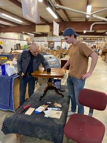 Expert demonstrates for apprentice - apprenticeship
