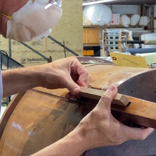 Our master carpenter, Cristian, repairs a broken antique table leg- antique furniture repair and restoration - raleigh, nc