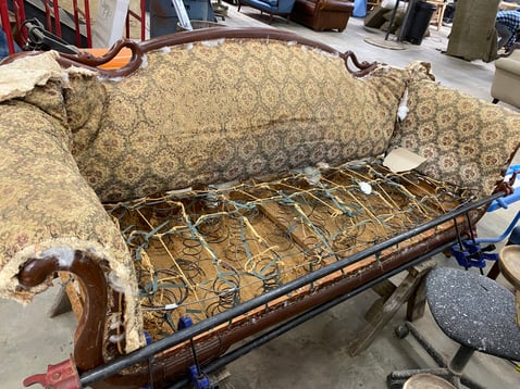 Sofa with a drop-in spring system-upholstery
