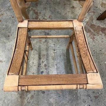 The frame of a rushed chair.