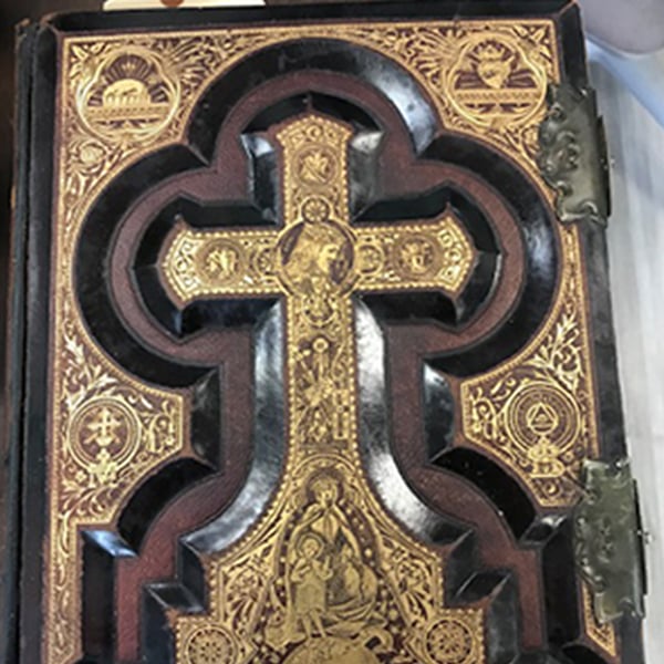 book repair restoration: black and gold bible front after