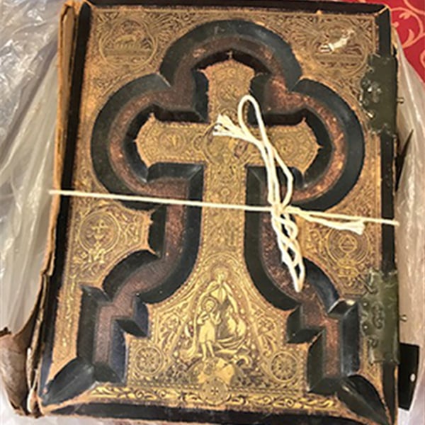 book repair restoration: black and gold bible front before
