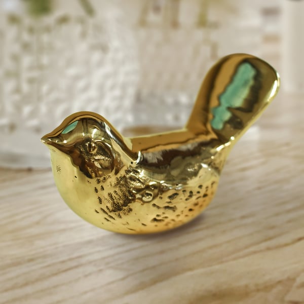 brass restoration: brass bird after
