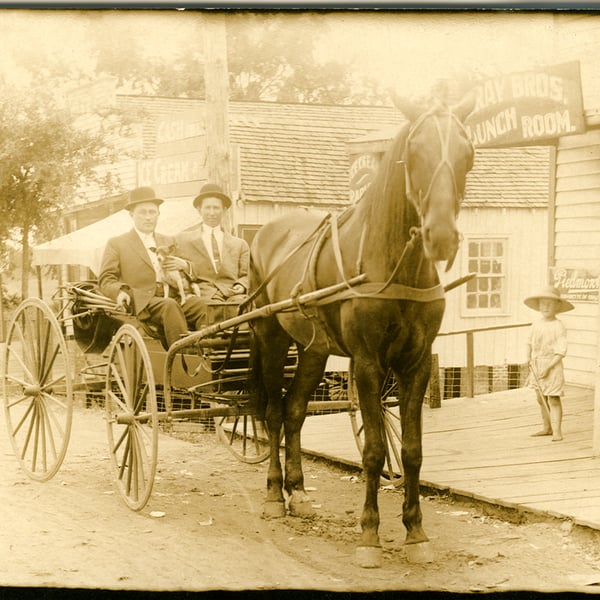 photography restoration men in wagon before