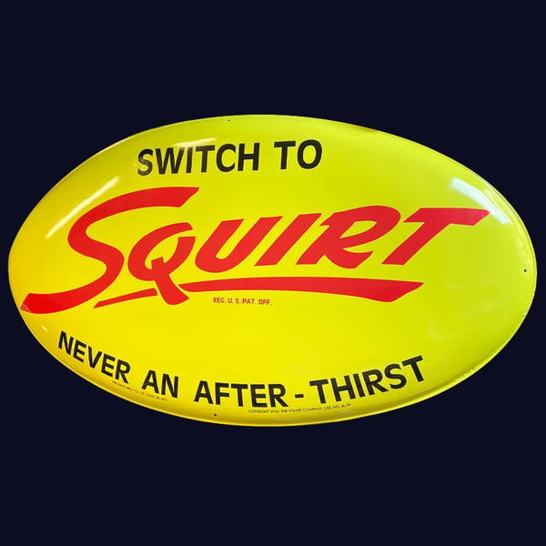 antique sign restoration: squirt soda sign after