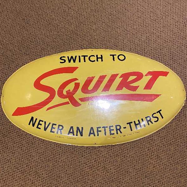 antique sign restoration: squirt soda sign before
