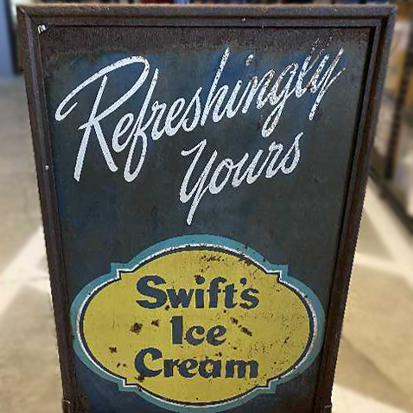antique sign restoration: swifts ice cream sign before