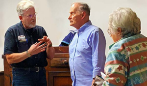 bernard with clients 300x175