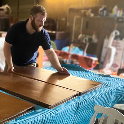 Arranging antique wood table leaves