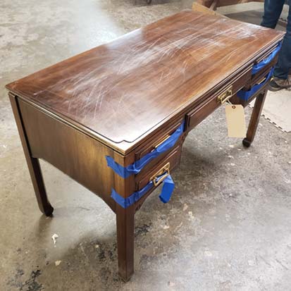 walnut desk with scratches on top 413