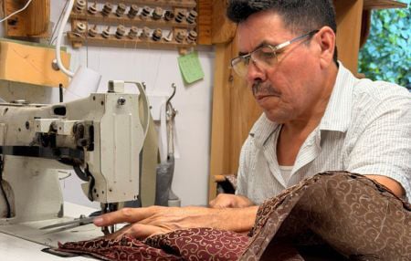 Mumford Restoration craftsman, Juan, at work